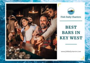 The image features a group of people enjoying drinks together at a bar, with smiles and a lively atmosphere. On the right side, the text reads, "Fish Daily Charters" and "Best Bars in Key West" with the website www.fishdailycharters.com at the bottom.